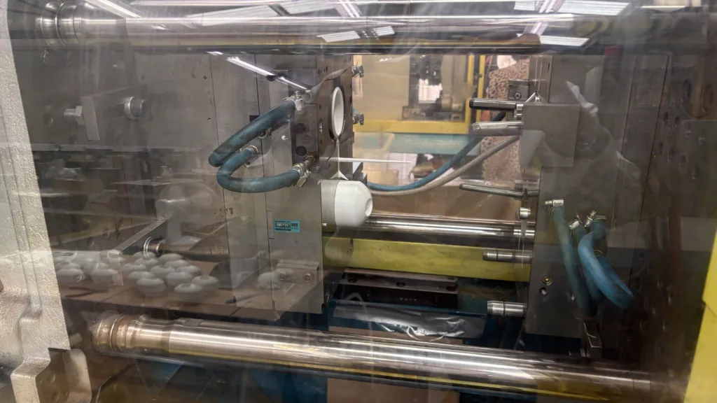 Boy 100T injection phase showing plastic product